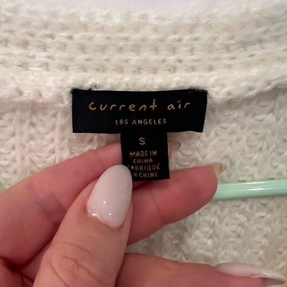 Adorable cream cardigan with puffy shoulder sleeve detail. - Picture 2 of 2